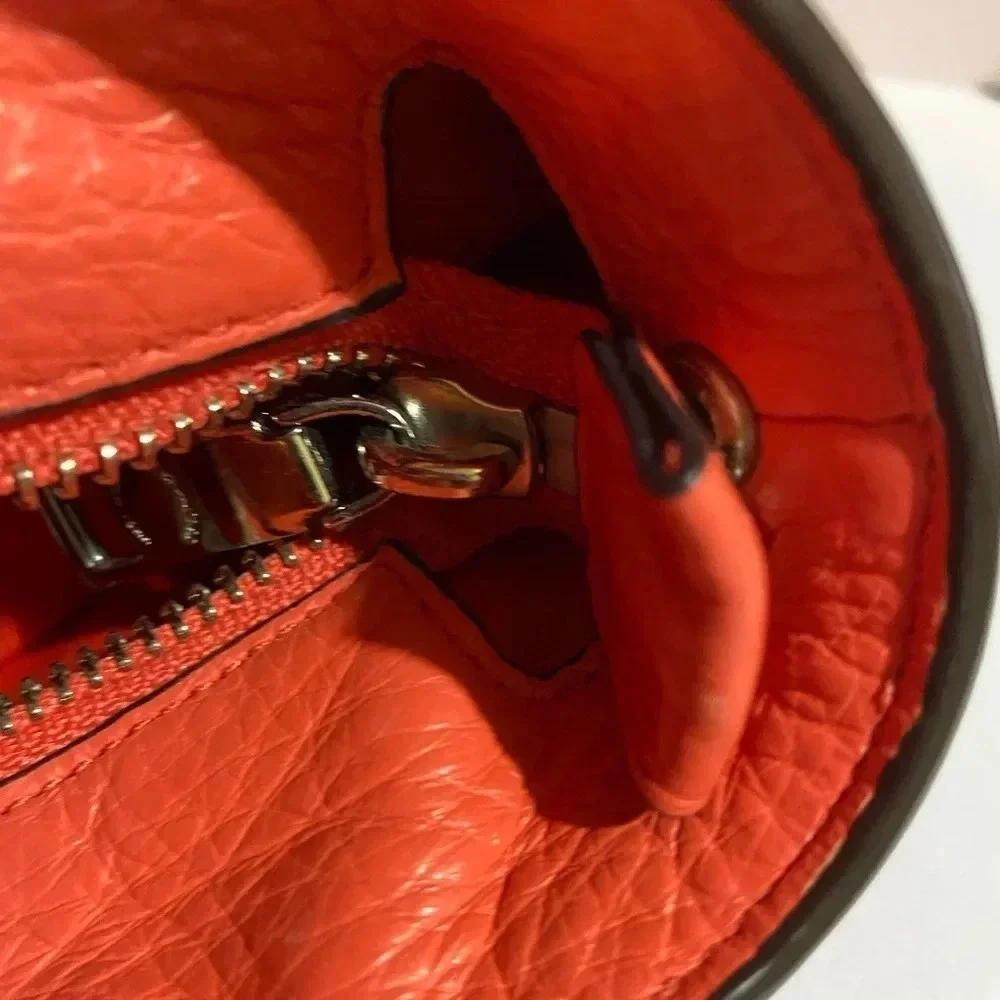 Coach coral leather